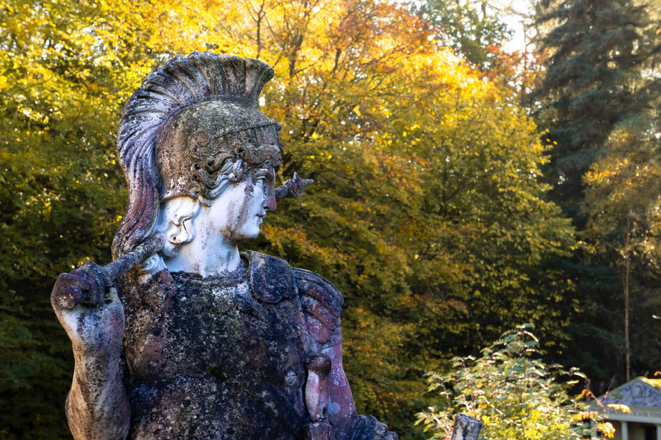 Standing guard at the corner of the patio outside the Vindolanda Café, a lone statue of a Roman Guard surveys the surrounding gardens overlooking the nearby Chainley Burn.
