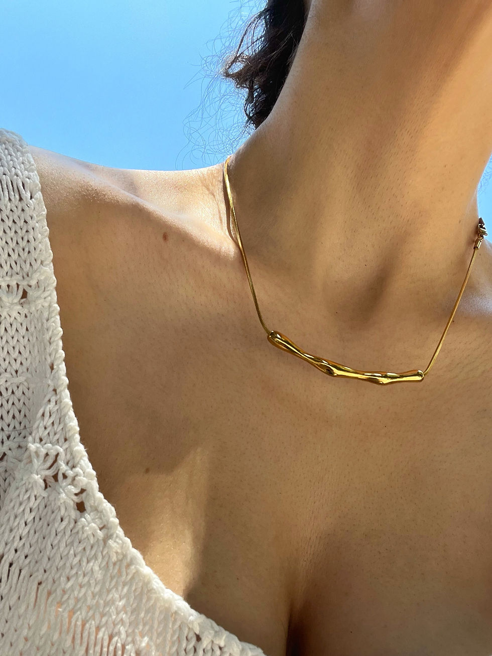 Thumbnail: POISED in gold