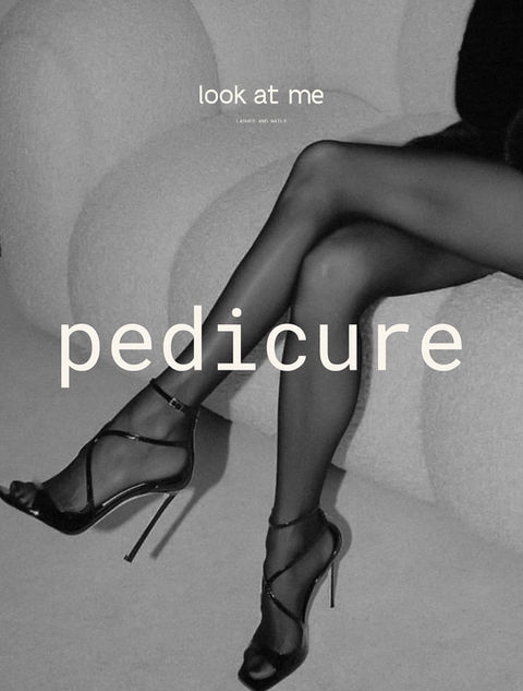 Crossed legs in heels with the text pedicure and look at me