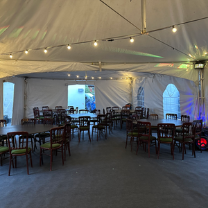 6x12 marquee setup with round tables and chairs. Also with carpet and hard flooring