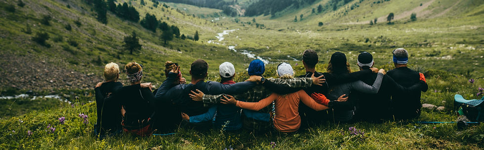 group_of_people_standing_near_each_other_in_front_of_mountain_ranges-scopio-837cee61-c0c3-