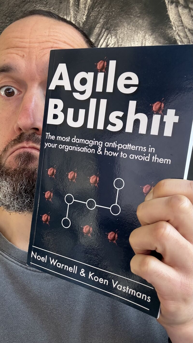 erik collard linkedin holding Agile Bullshit book by Noel Warnell and Koen Vastmans