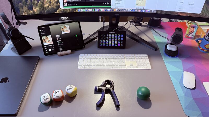 erik collard linkedin Home office desk setup with ultra-wide monitor and focus tools