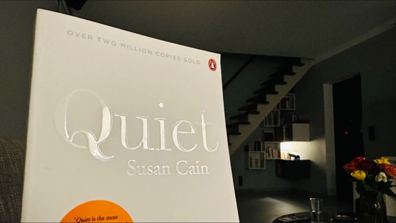 erik collard linkedin reading Quiet by Susan Cain book about introvert power in evening setting