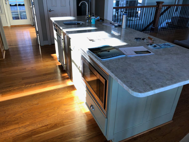Kitchen Island with Cooking Area Prior to Renovation - Daniel Builders