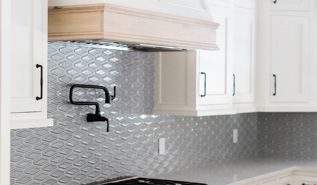Freshly Renovated Custom White Kitchen with Light Blue Subway Tile - Daniel Builders