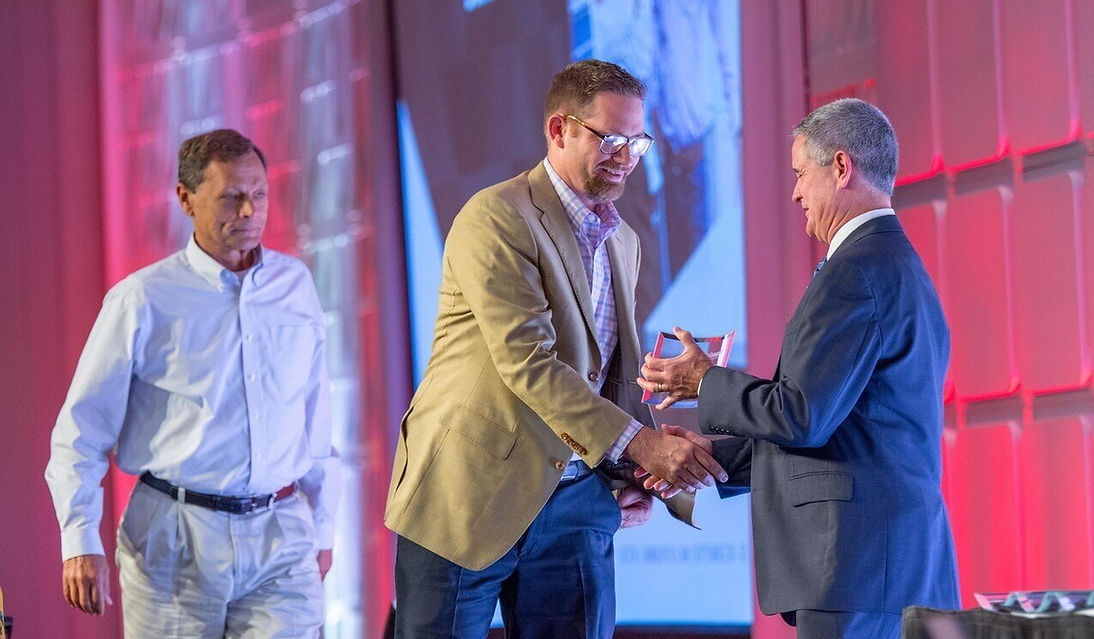 Daniel Jachens and Bob Cord Receiving Big 50 Award - Daniel Builders