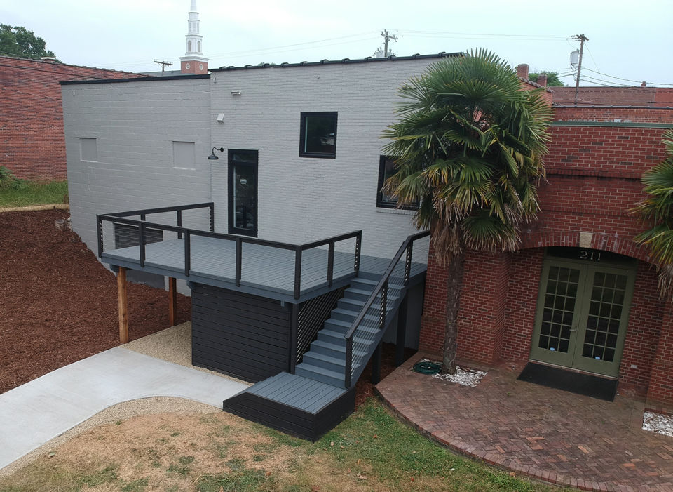 Rear of Daniel Builders Offices in Anderson SC After Remodel and Deck Addition - Daniel Builders