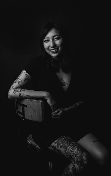 Zee Tattooist at Tattoolicious Hawaii Fine Line delicate tattoos