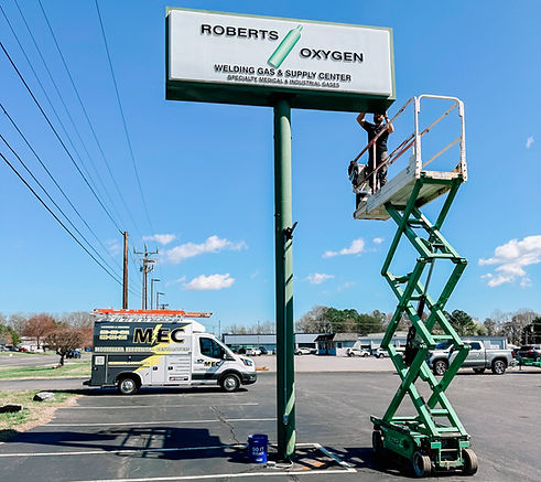 Mosteller Electrical Contractors (MEC) installs business storefront lighting at a business establishment in Longview, NC.
