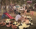 Filipino community volunteers working together in bayanihan to build a bahay kubo–themed float during the Arborg festival.
