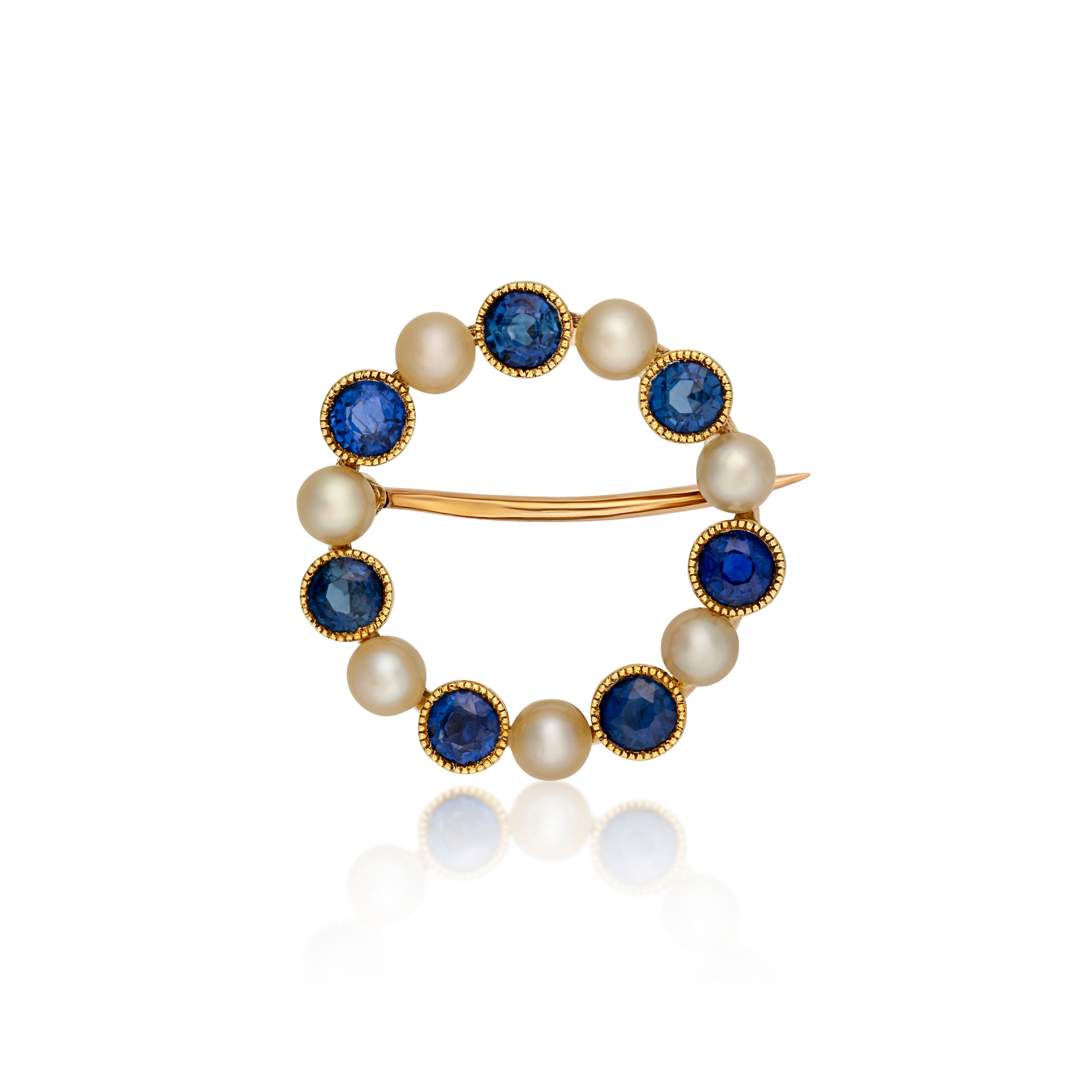 Sapphire & pearl circle brooch