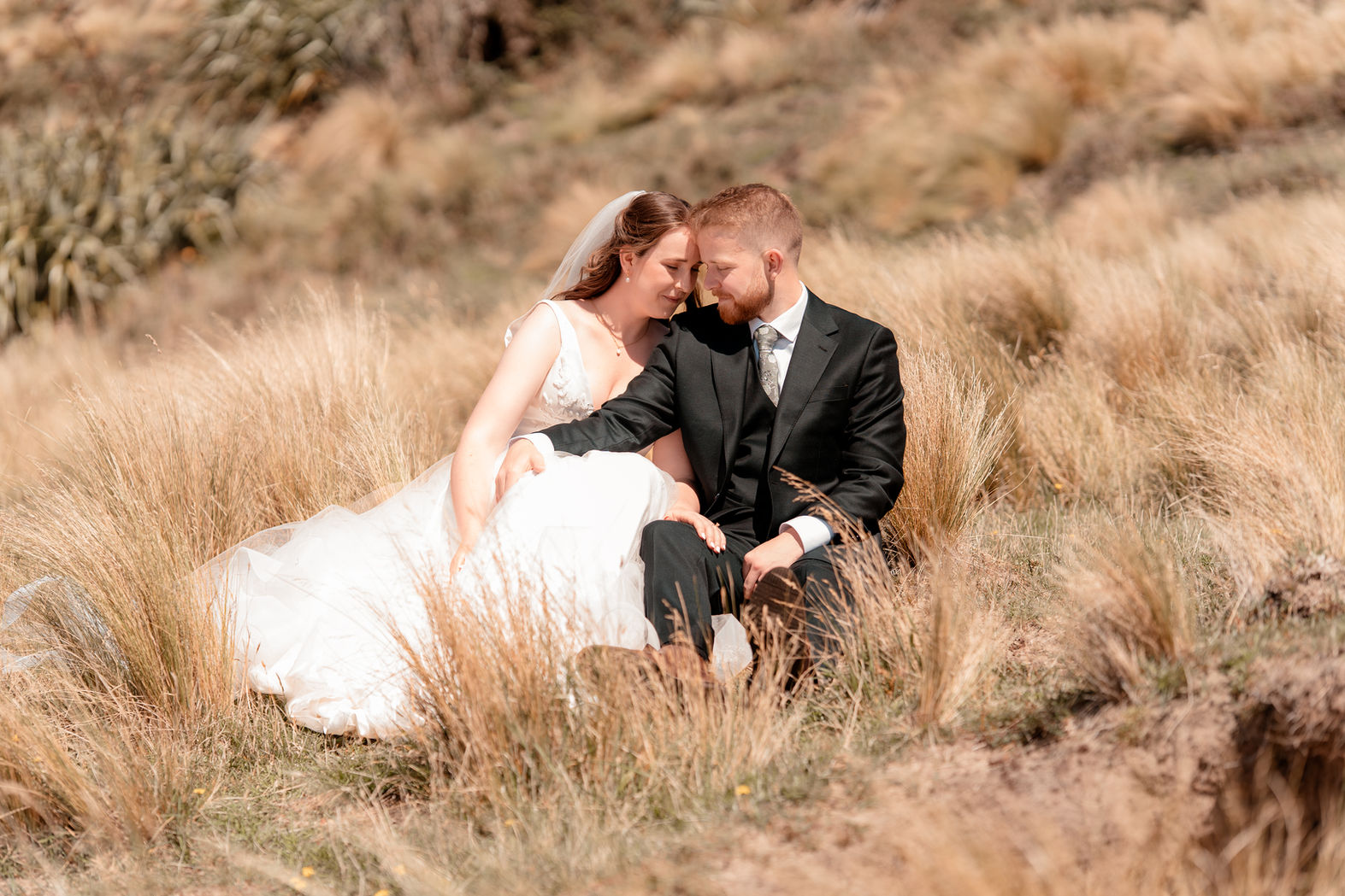 Enjoying each others company amid wedding celebrations, shot by photographer Nakita Marx.