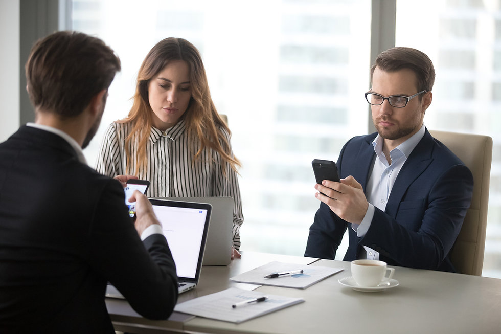 workers in office with mobile devices .jpeg