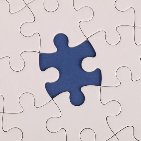 Close up of jigsaw puzzle piece missing