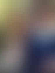 Man holding giant porcini mushrooms