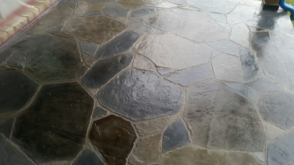 Custom stained concrete by All Innovative Concrete.