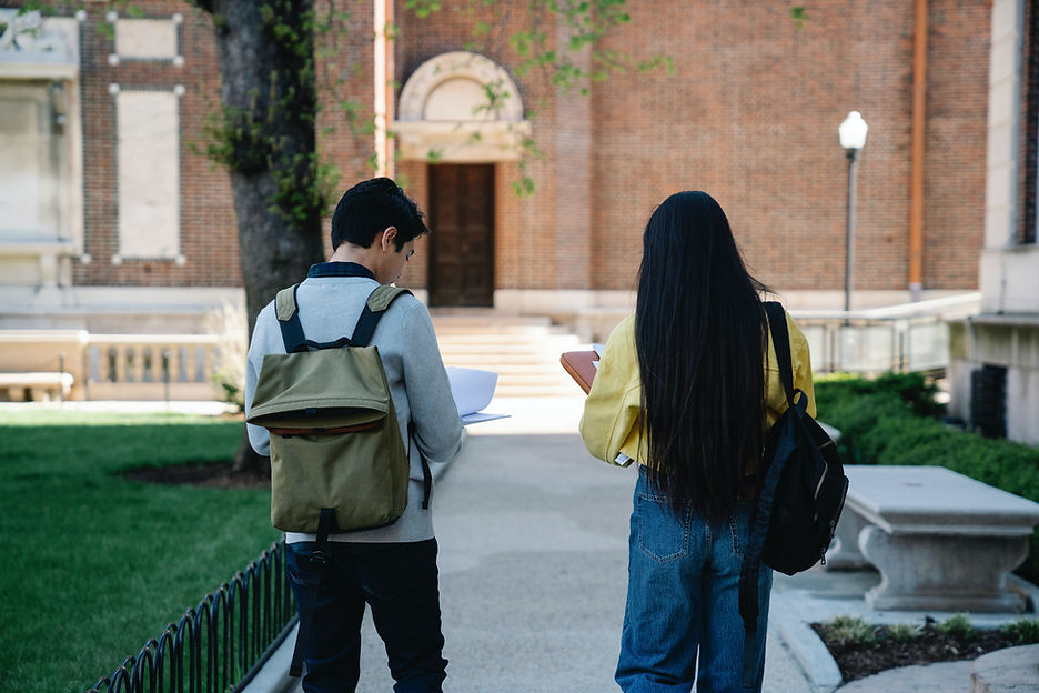 Two college students walking on campus
