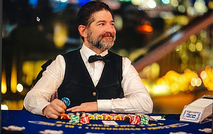 Professional Blackjack dealer with Casino Chips At Blackjack by Full House Casino Rentals