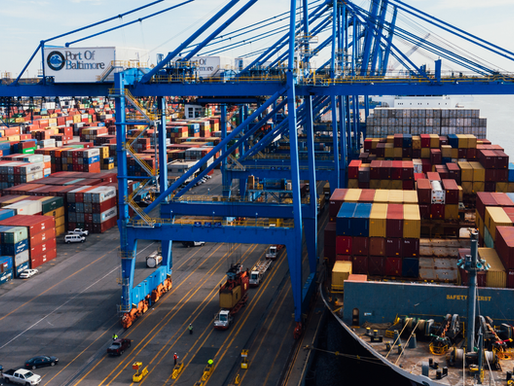 Container ship loading construction materials at a commercial port supporting global infrastructure and concrete supply chains