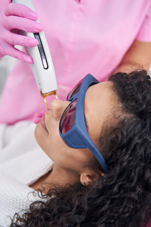 Grace Grymes Chapman DNP performing laser treatment at Inclusive Aesthetics Normandy Park