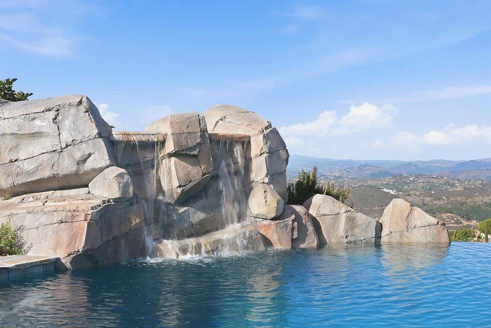 Custom carved rock waterfall with a view.