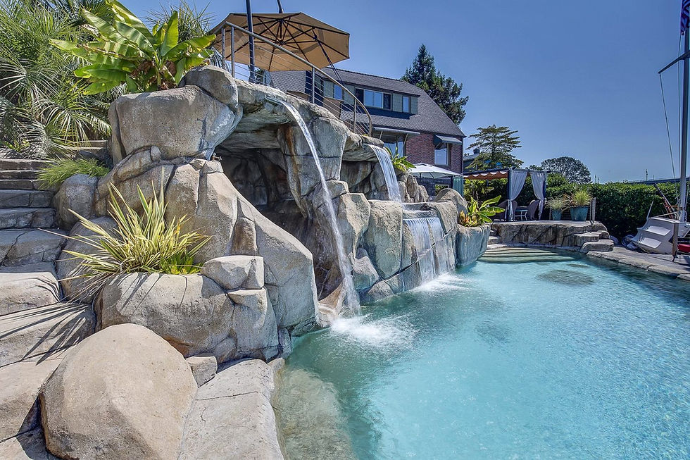 Carved rock pool by Pacific Northwest Pools & Concrete Design