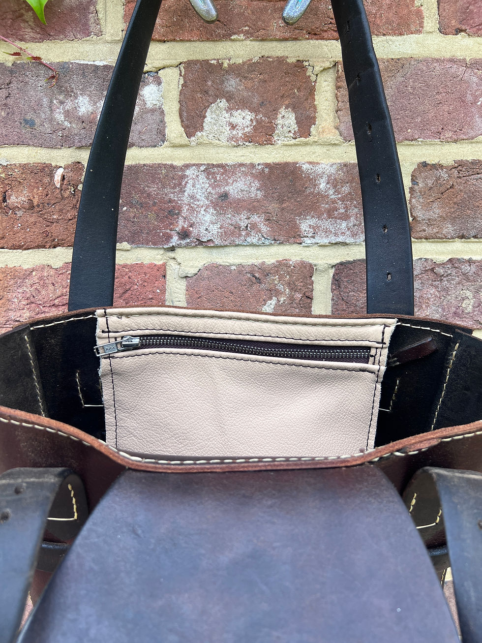 Thumbnail: “Order of the Dance” The saddle tote