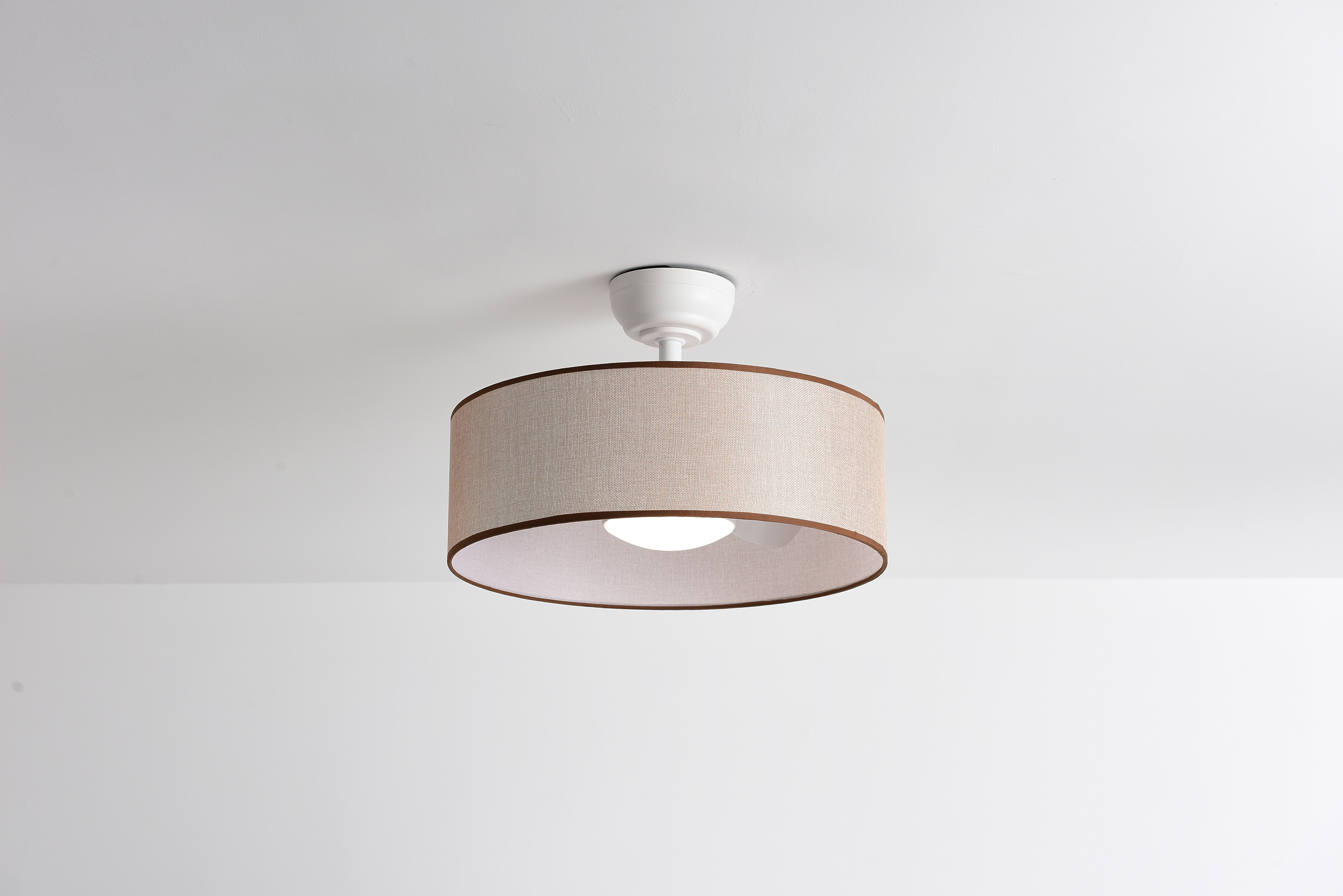 Fabric drum ceiling fan with light