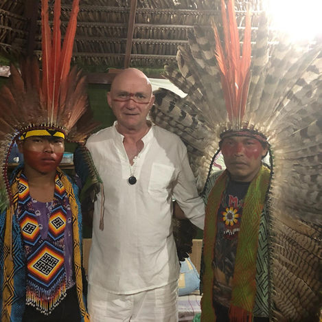 Shaman Alan Waugh posing for a photo with his Shipibo maestro, Bire, and Bire's son.