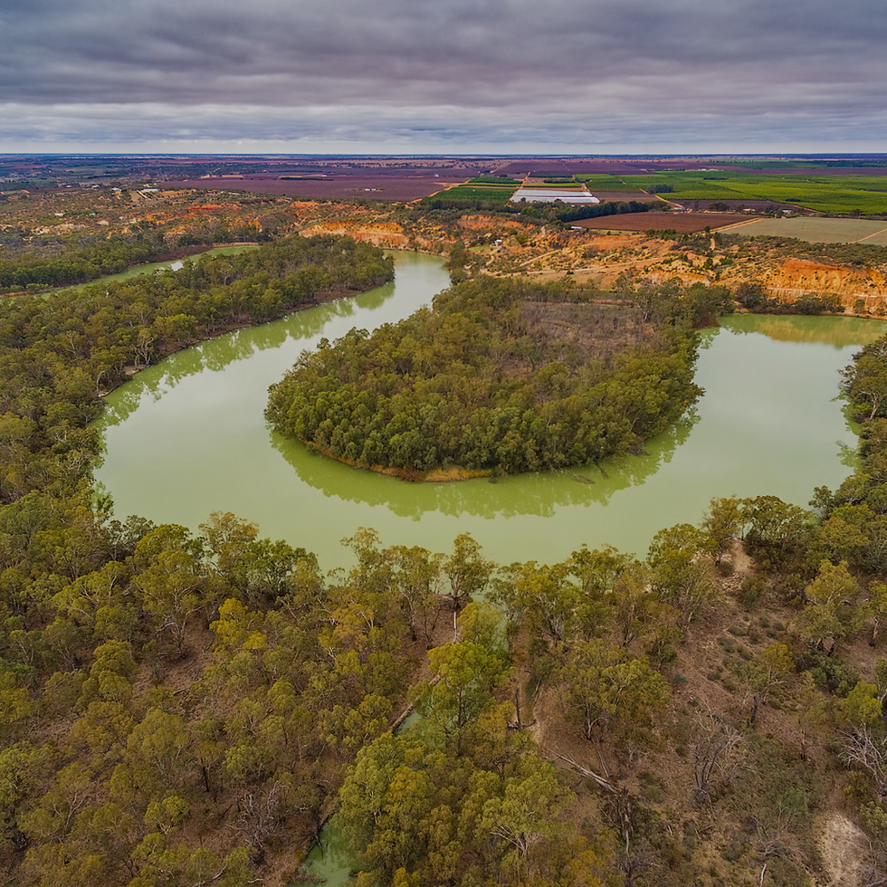 Aerial view of a winding river bend in rural Australia.