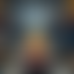 A warehouse staff driving forklift in a large warehouse space