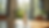 Eye-level view of a sleek eco-friendly water bottle on a wooden table