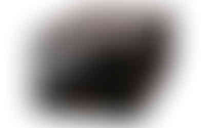 Electrocompaniet AW 800 M seen from an angle, combining the elegance of a glossy black finish with functional, minimalist design.