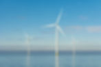 Offshore Windmill farm in the ocean Westermeerwind park 3 windmills isolated at sea on a