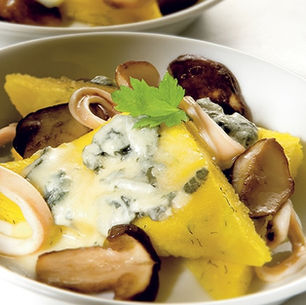 Triangoli di polenta con gorgonzola e calamaretti
