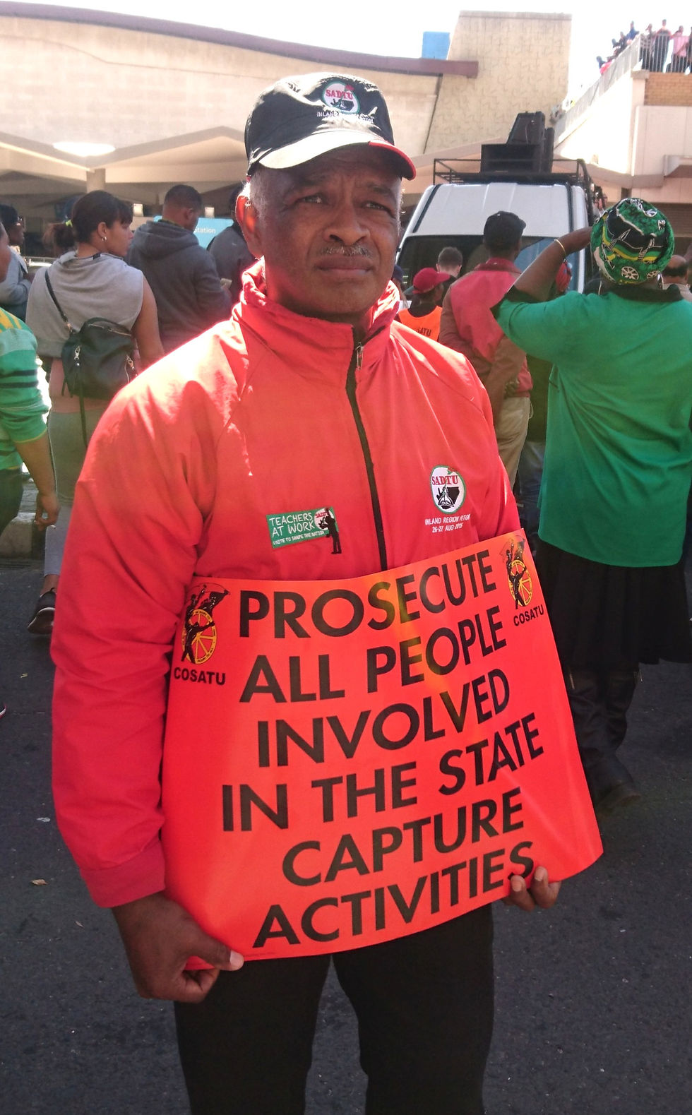 Archival 2017 photograph of a COSATU demonstrator protesting corruption in Cape Town, unrelated to the 2026 congress.