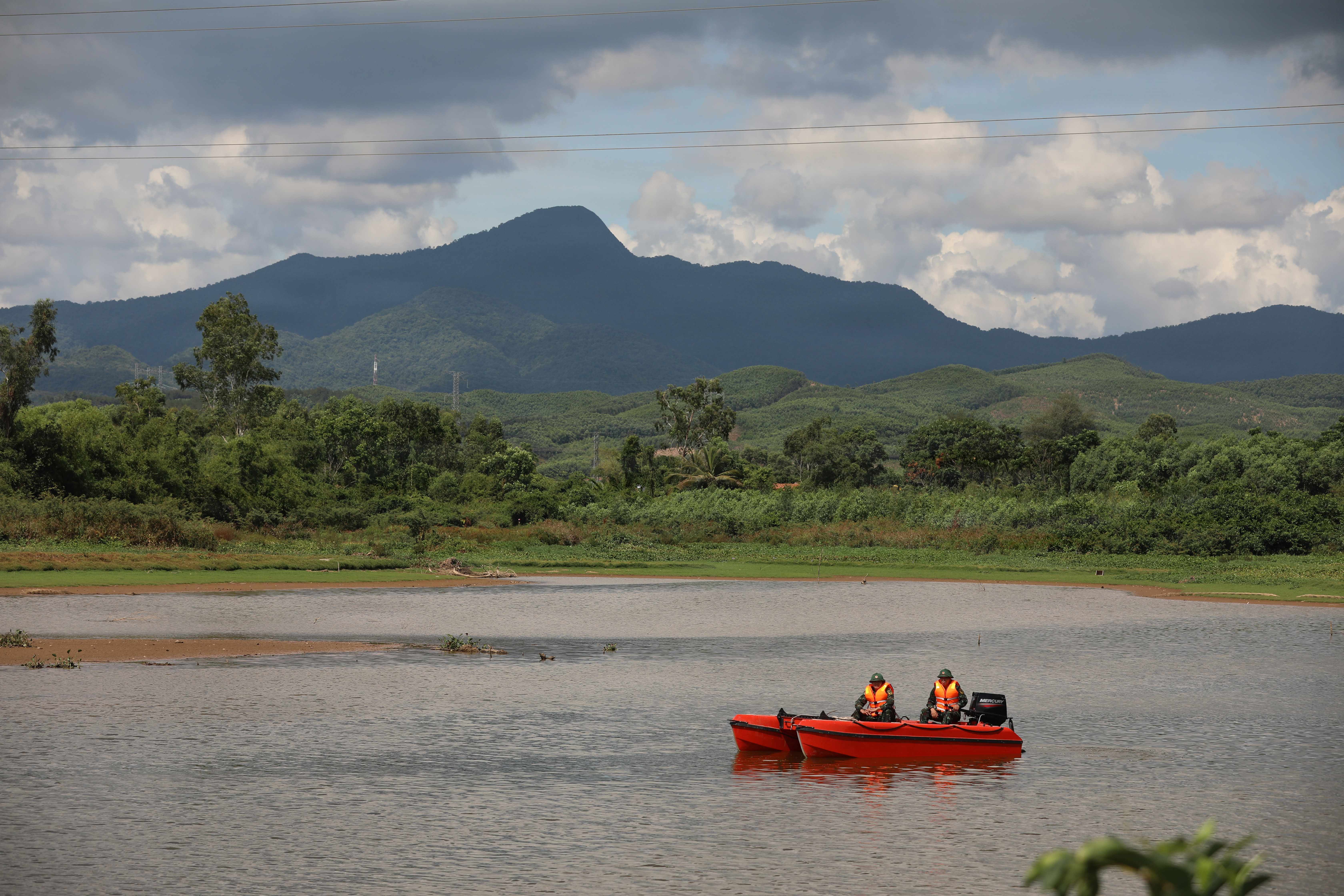 Archival June 2026 photograph of Vietnamese and U.S. personnel practicing water rescue in Vietnam; unrelated to the October 14 trilateral drill
