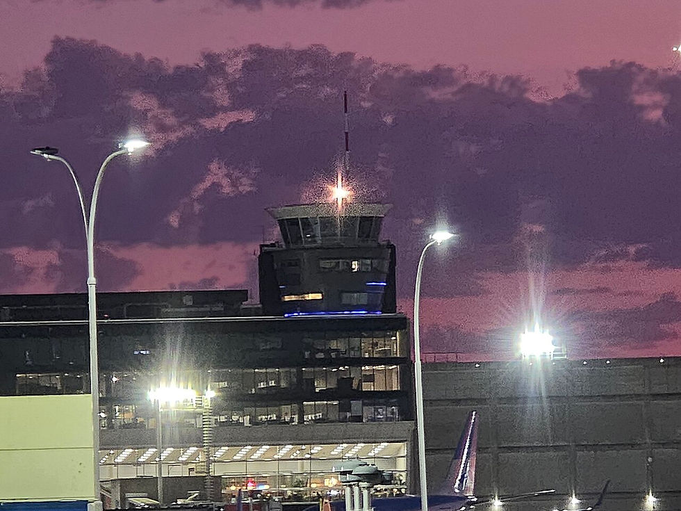 Aeroparque Jorge Newbery airport control tower in Buenos Aires at dawn, archival photograph.