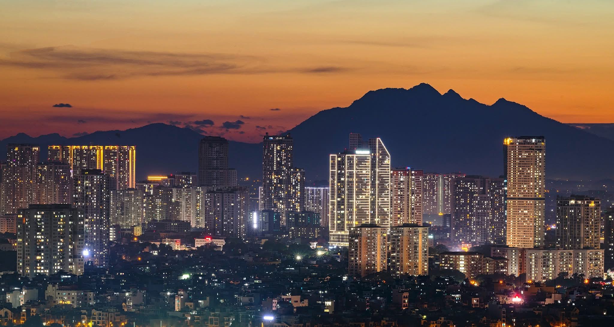 Hanoi skyline photographed in June 2025; illustrative location image, not the October 2026 trade ceremony