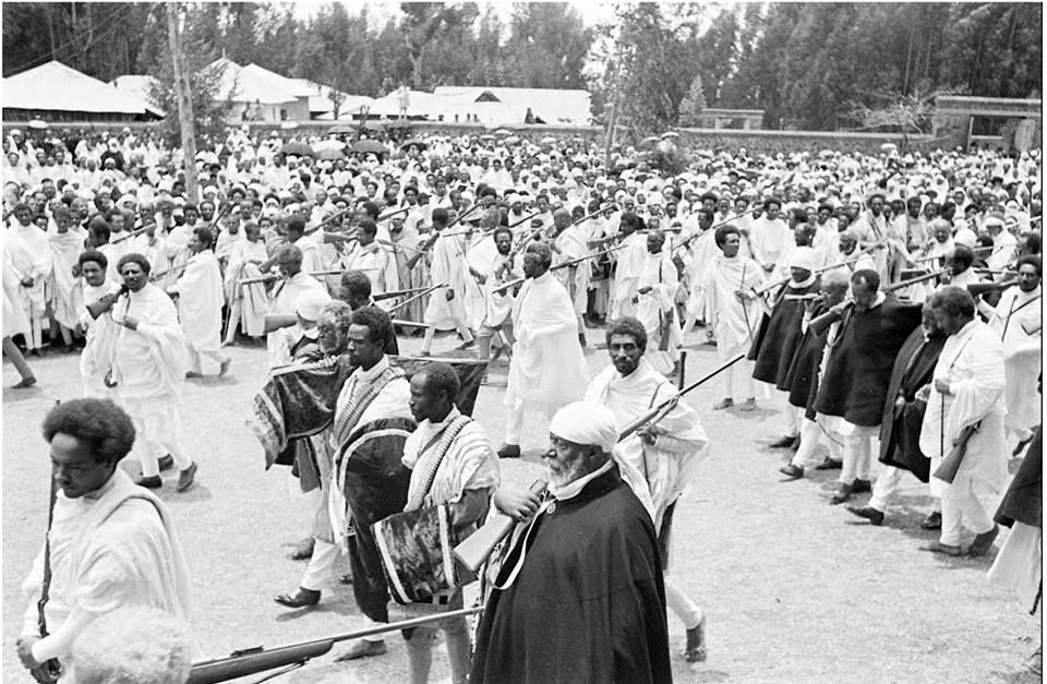 Archival photograph of Ethiopian soldiers carrying rifles in 1935.
