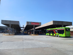 An electric SPTrans bus at São Paulo's Cidade Tiradentes terminal in May 2025; illustrative, not an October 2026 event