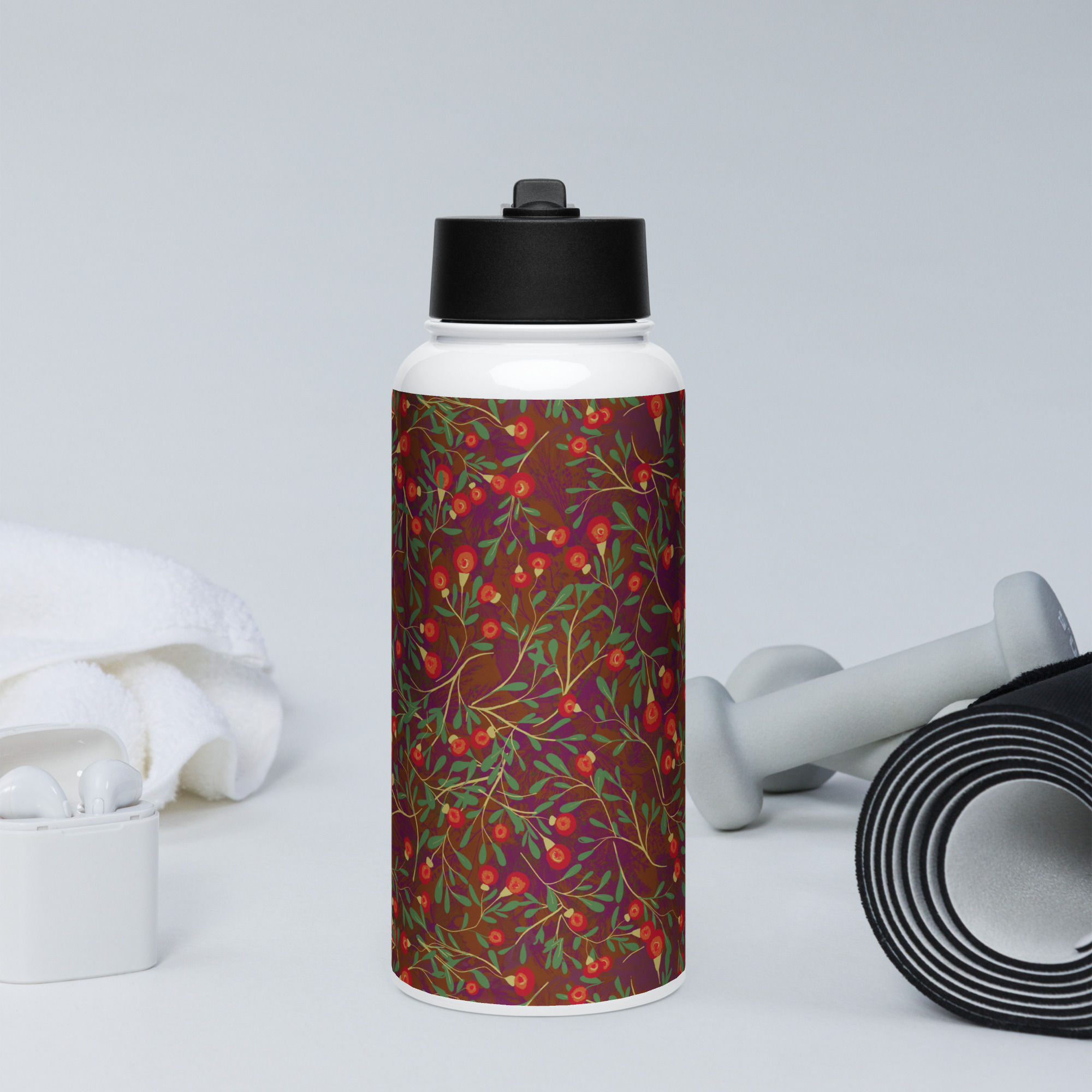 Stainless steel water bottle with a straw lid