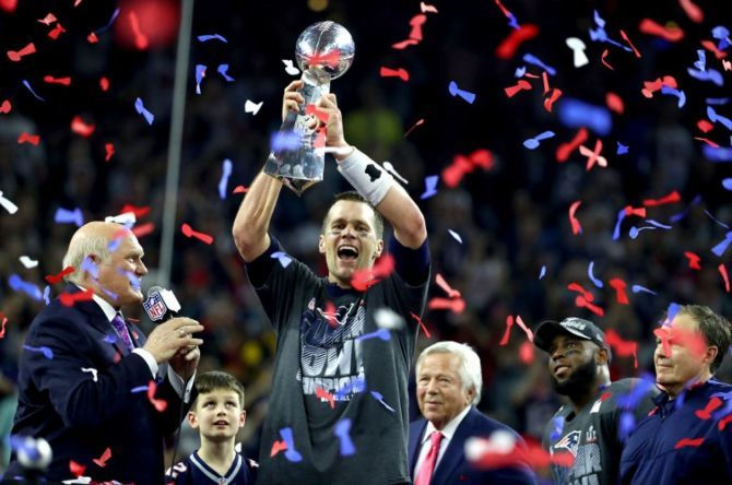 Tom Brady of the New England Patriots celebrates after defeating the Atlanta Falcons at Super Bowl 51. Photo credit: Kevin C.Cox / Getty Images