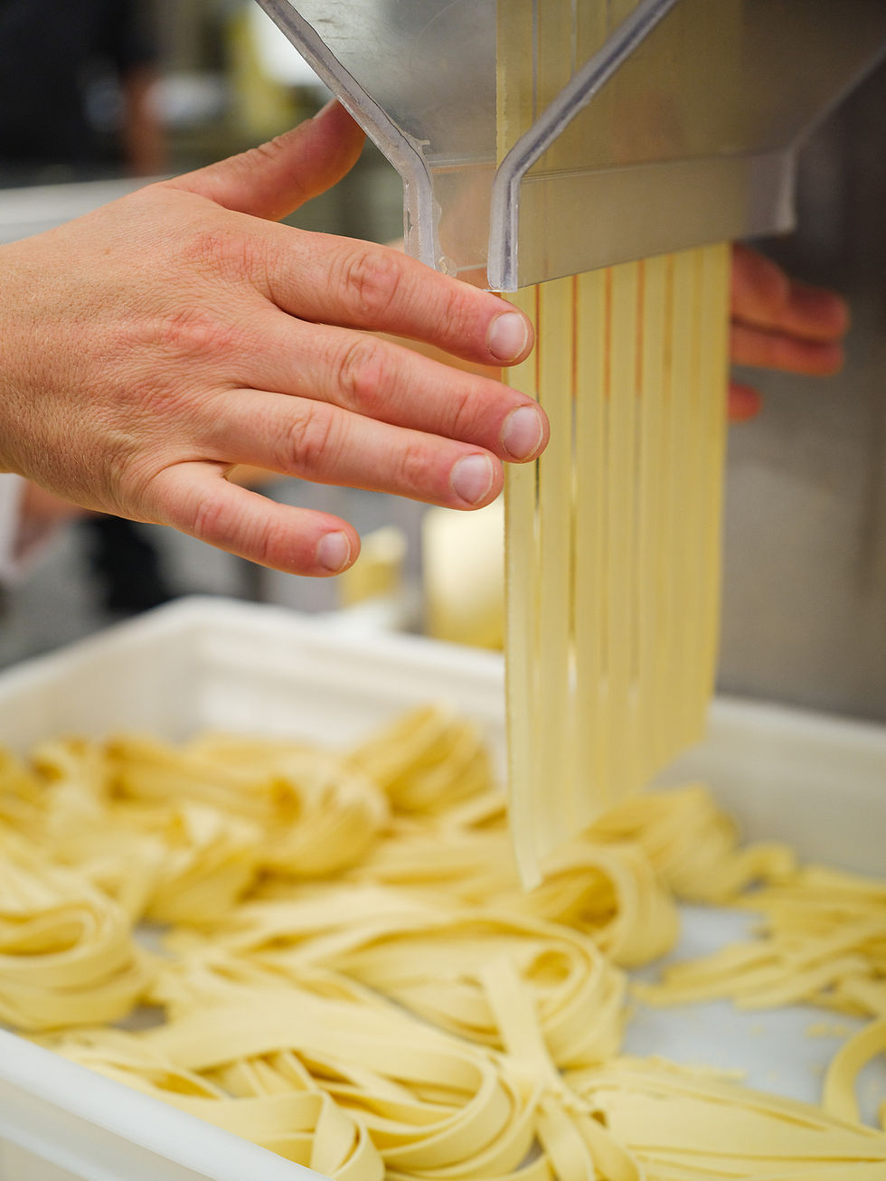 Fresh pasta is made in the traiteur kitchen of the Grande Épicerie Massen.