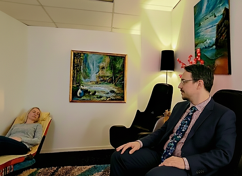 Brad Hypnotherapist with client in the cliinc room updated.png