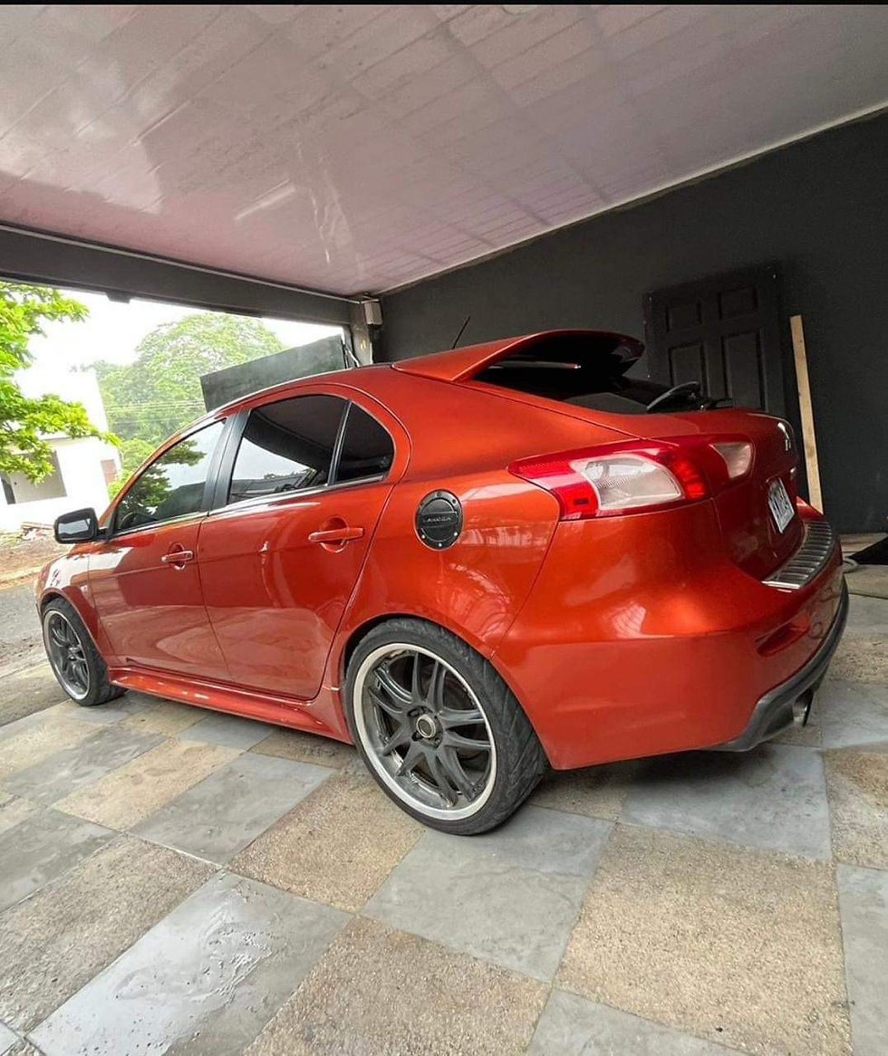 Miniatura: Mitsubishi Lancer 2011