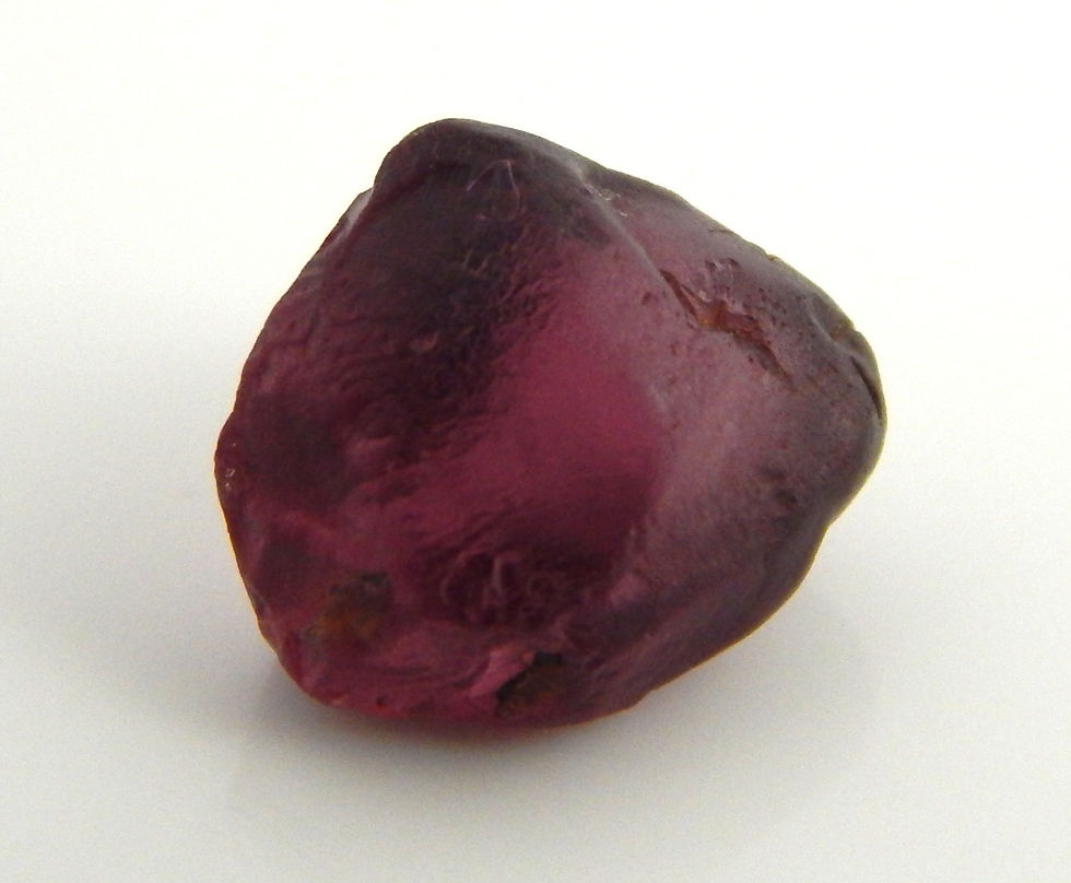 Thumbnail: Umbalite Garnet Facet Rough 0.7 Grams (#64)