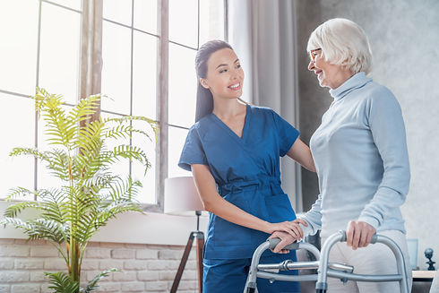 Nurse Caring for Elderly Woman