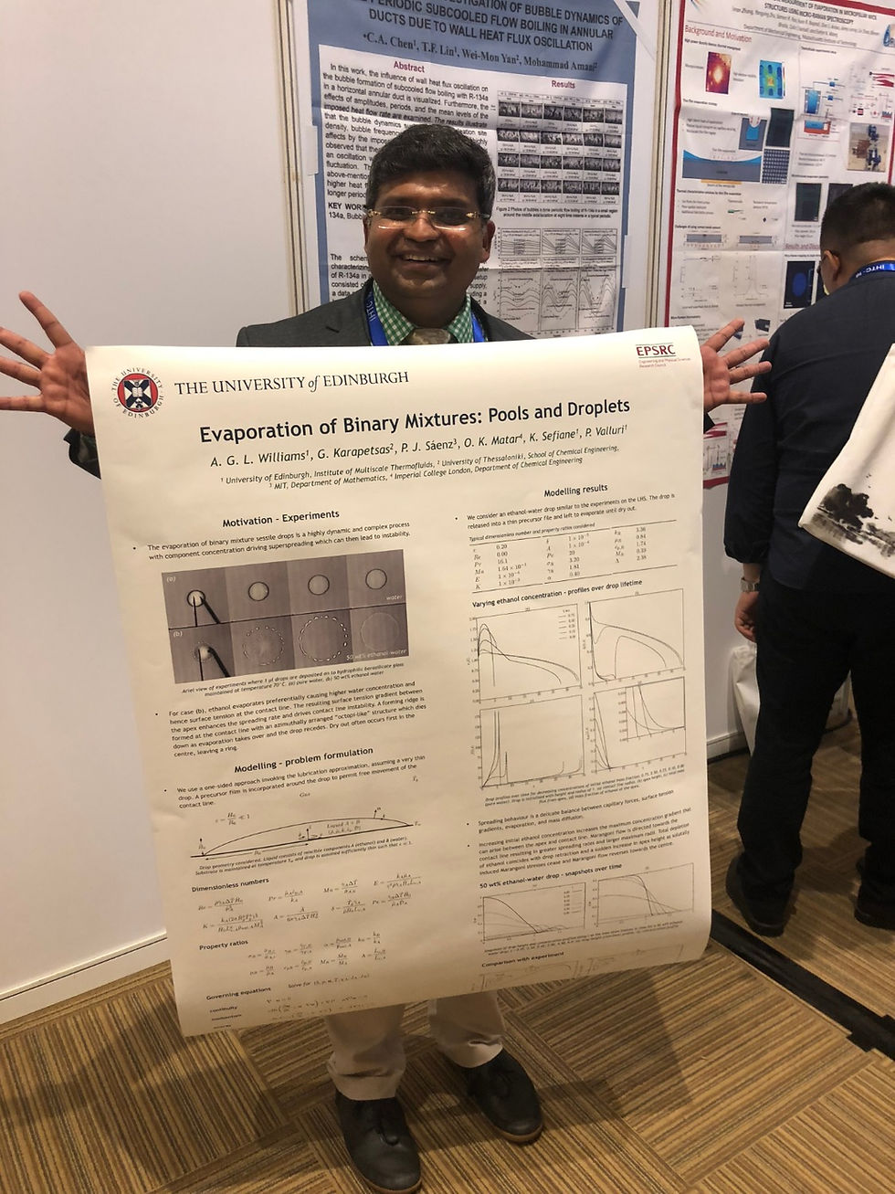 Dr. Vallouri presenting his poster on "Evaporation of Binary Mixtures: Pools and Droplets".
